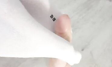 Russian Milf Milky Gives Devilish Sock Footjob to Giant Dick
