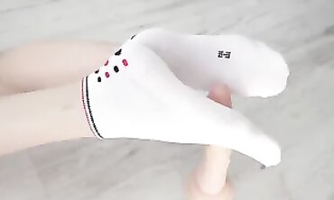 Russian Milf Milky Gives Devilish Sock Footjob to Giant Dick