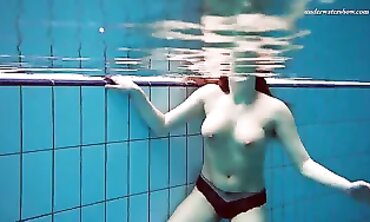 POV: Stunning Brunette Vestka Swims Nude in Public Pool