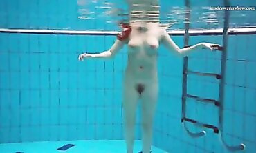 POV: Stunning Brunette Vestka Swims Nude in Public Pool