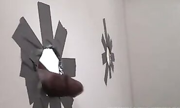Abbey Brooks Gets Interracial Glory Hole Action