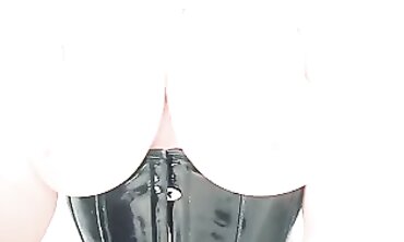 Queen Arya Grander Teases in Latex Corset and Stockings