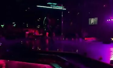 Sugar Baby's Tall Tattooed Striptease Spectacle