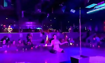 Sugar Baby's Tall Tattooed Striptease Spectacle