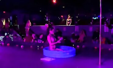 Sugar Baby's Tall Tattooed Striptease Spectacle