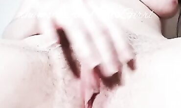 Busty Hairy Girl Plays With Her Cunny