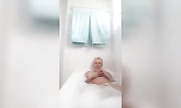 Blonde MILF With Big Tits Enjoys A Solo Bath