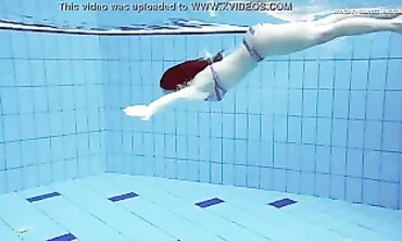 Liza Bubarek Swims Nude in the Pool