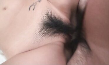 Highly magnificent inked Japanese female Asami Uemura gets a geyser of jizz in her honeypot