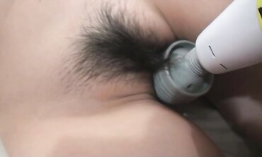 Highly magnificent inked Japanese female Asami Uemura gets a geyser of jizz in her honeypot