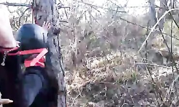 Laura On Heels Bound and Gagged Outdoors in Latex