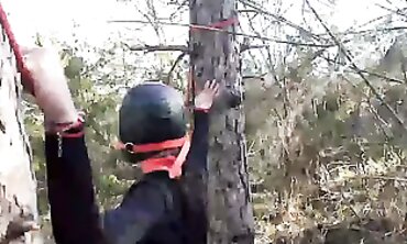 Laura On Heels Bound and Gagged Outdoors in Latex