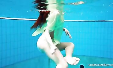 Nina Gets Hairy and Bare in an Underwater Scene