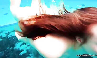 Nina Gets Hairy and Bare in an Underwater Scene