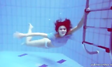 Barely Legal Redhead Marusia Swims Naked Underwater