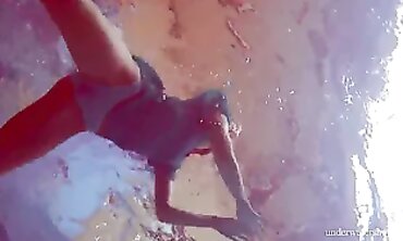 Barely Legal Redhead Marusia Swims Naked Underwater