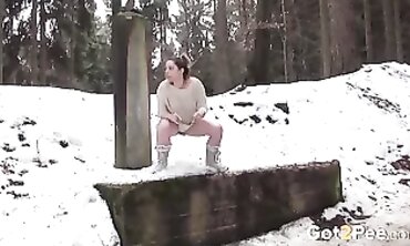 Curvy Brunette Beauty Pisses In The Snow