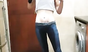 Desperate Brunette Pisses Into Jeans After Smoking
