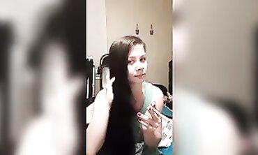 Joy Smokes and Plays with Her Hair in a Cute T-Shirt