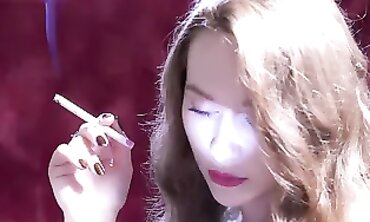 Close Up of a Smoking Redhead