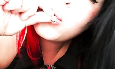 Redhead college girl Teases With Cigarette