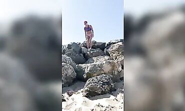 Stunning MILF Shows Off Long Legs in Bikini