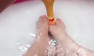 Joy Performs a Sensual Footjob in the Shower