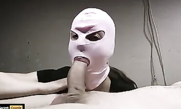 Hooded MILF Gives Head To A Giant Cock