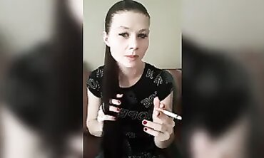 Petite Ebony MILF Joy Smokes and Has Fun in Dark T-Shirt