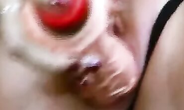 German Ebony with Glasses in Dark Nylons Plays with Toy