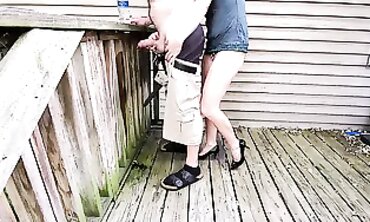 Blonde MILF Pisses Off Deck While Holding Her Manhood