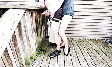 Blonde MILF Pisses Off Deck While Holding Her Manhood