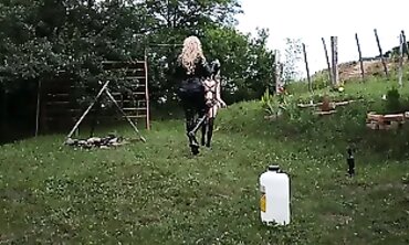 Sweetie Gothic Dom Trains Her T-Girl Steed in Latex