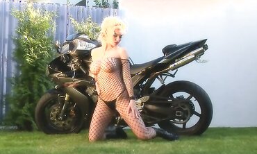 Towheaded Ultra-Cutie Caylian Curtis Is A Biker's Wish In Fishnet Solo Gig