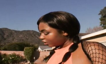 Karmella Kreme Wears Her Ebony Fishnets While Taking Dark-Hued Rod