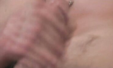 Guy with pierced nip and torso tat faps off and blows his fountain on his tummy.