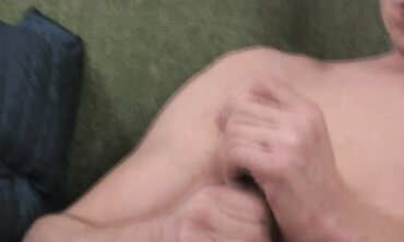 Guy with pierced nip and torso tat faps off and blows his fountain on his tummy.