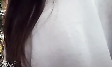 MILF Milky Shows Off Her Boobs In A White T-Shirt Outdoors