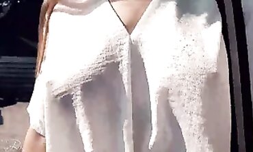 MILF Milky Shows Off Her Boobs In A White T-Shirt Outdoors