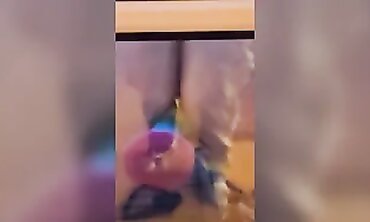 Redhead MILF Gives a Playful Blowjob at the Window