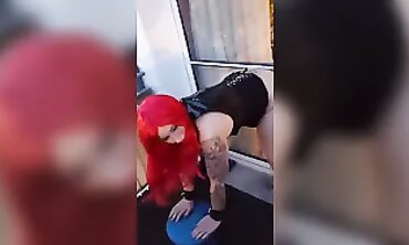 Redhead MILF Gives a Playful Blowjob at the Window