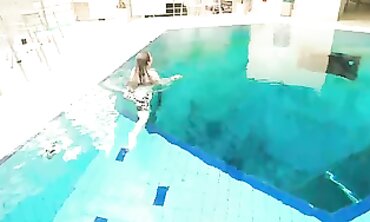 Hairy Brunette Marketa Swims Underwater in Sensual Softcore Scene