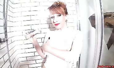 Red Xxx Gets Oiled Up and Masturbates in the Shower