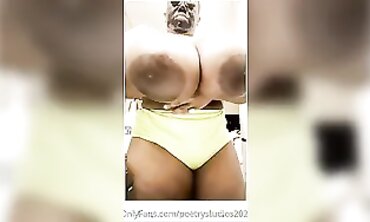 Ebony Babe With Huge Boobs Wearing A Face Mask