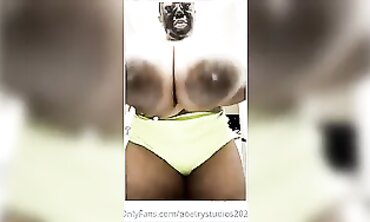 Ebony Babe With Huge Boobs Wearing A Face Mask