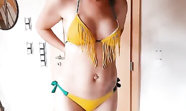 Juicy MILF On Tries On Bikini in Solo Scene