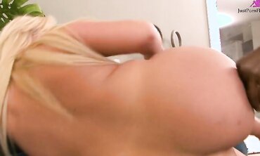 Big Blonde with Long Hair Loves Black Cock
