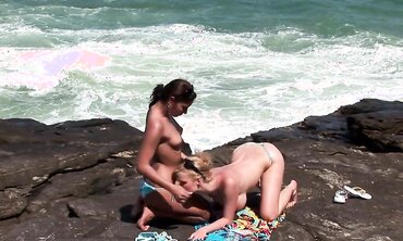 Steamy Outdoor Lesbian Sex with Tattooed Brunette and Blonde