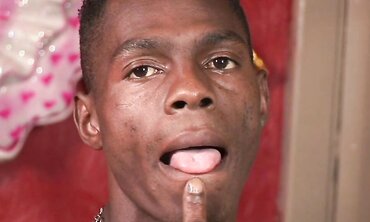 Solo Black Guy Strokes His Massive Cock In Dark Trousers