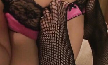 Asian Brunette in Fishnets and High Heels